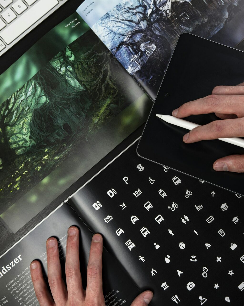 Designer working with a stylus on a tablet showing icon design and graphic patterns — the visual-polish trap